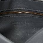 Bottega Veneta Grained Calfskin Maxi Intrecciato Cassette Crossbody Bag Thunder