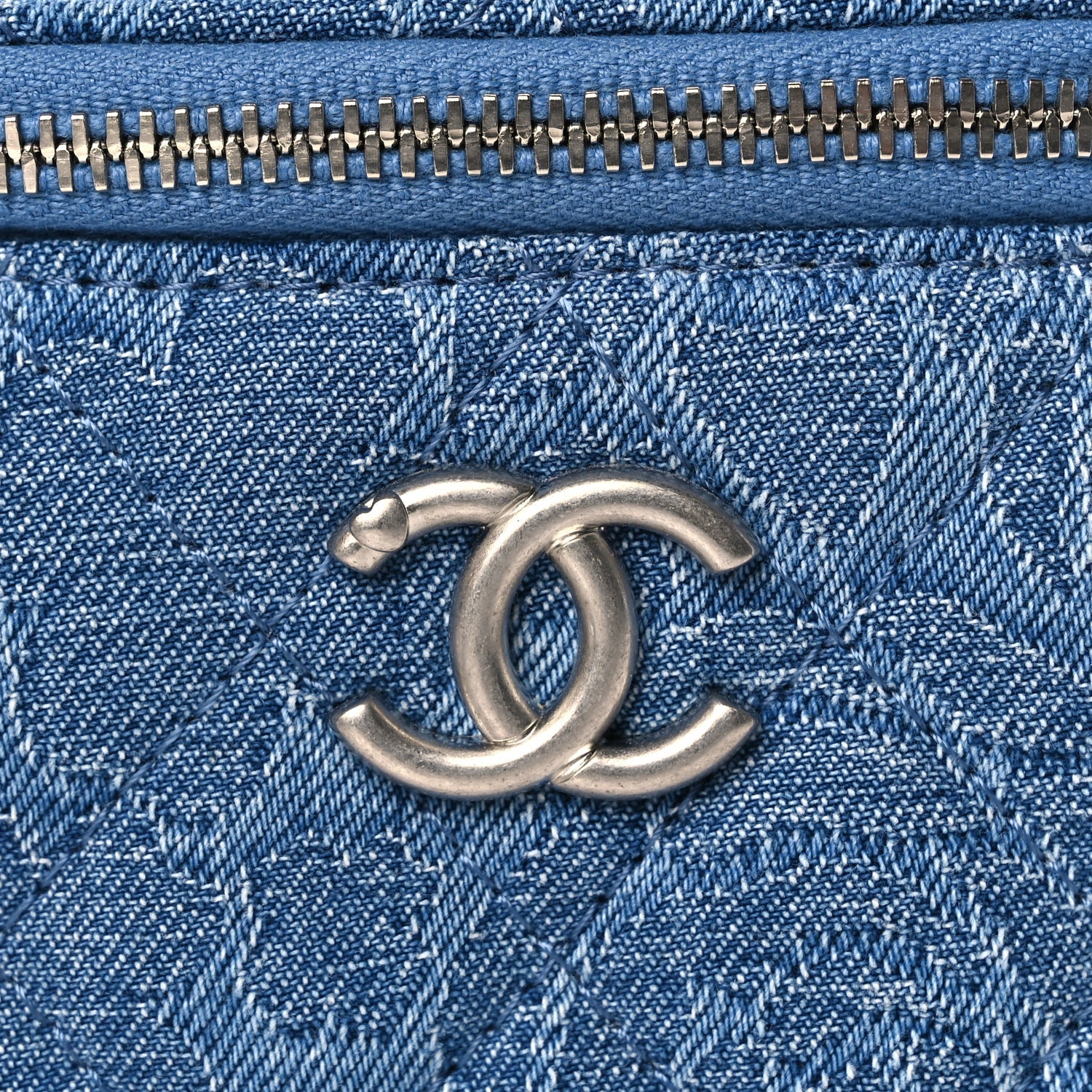 Chanel Denim Quilted Camellia Sweetheart Mini Vanity Case With Chain Blue
