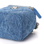 Chanel Denim Quilted Camellia Sweetheart Mini Vanity Case With Chain Blue